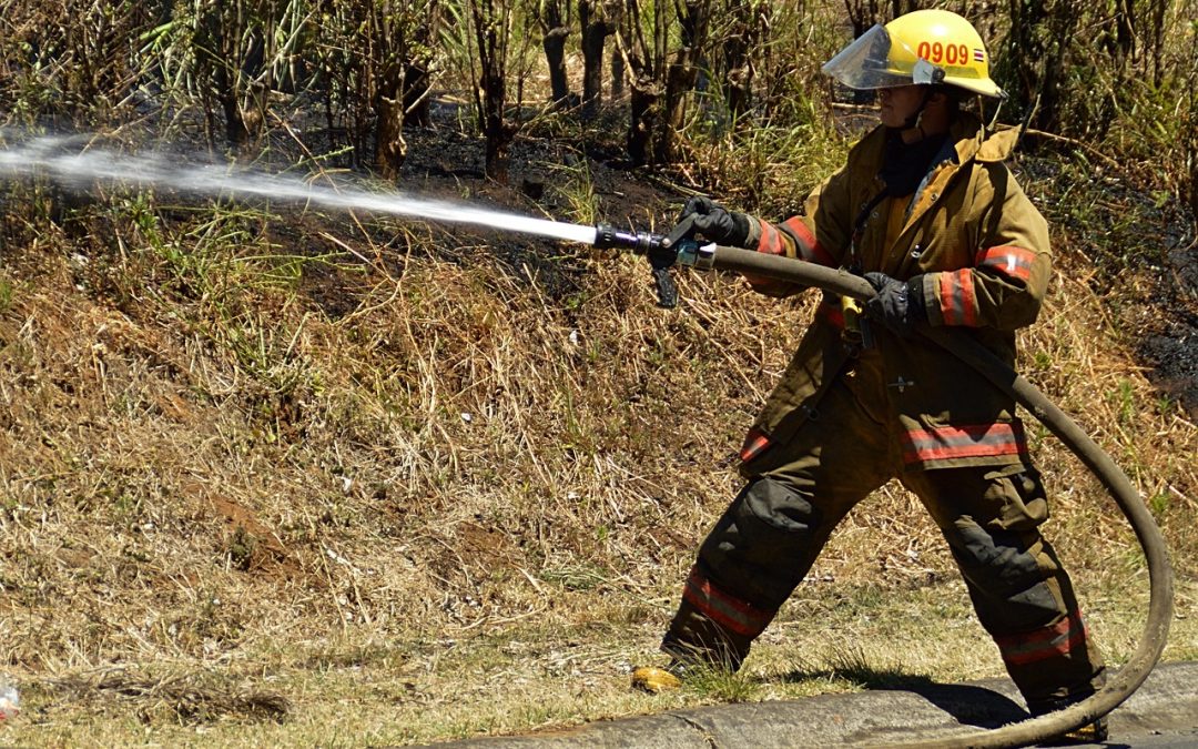Penyemprotan Disinfektan di Pelabuhan